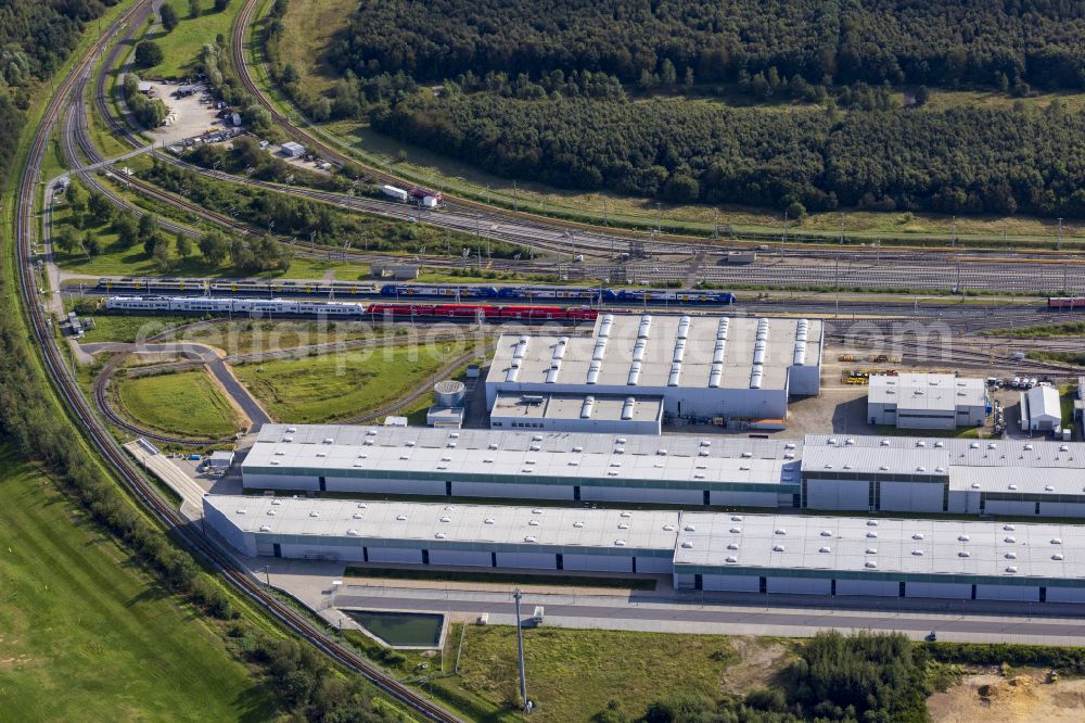 Wegberg from the bird's eye view: Railway depot and repair shop for the maintenance and servicing of rail vehicles Pruef- and Validationscenter on street Friedrich-List-Allee in the district Wildenrath in Wegberg in the state North Rhine-Westphalia, Germany