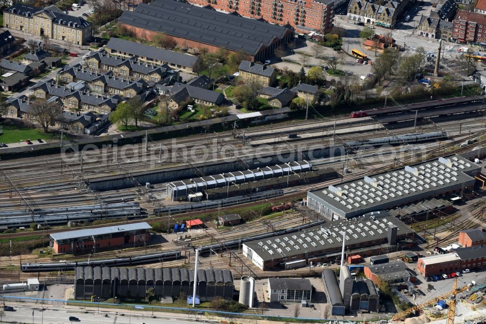 Kopenhagen from the bird's eye view: Railway depot and repair shop for maintenance and repair of trains of passenger transport on train station Svanemollen in Copenhagen in Denmark