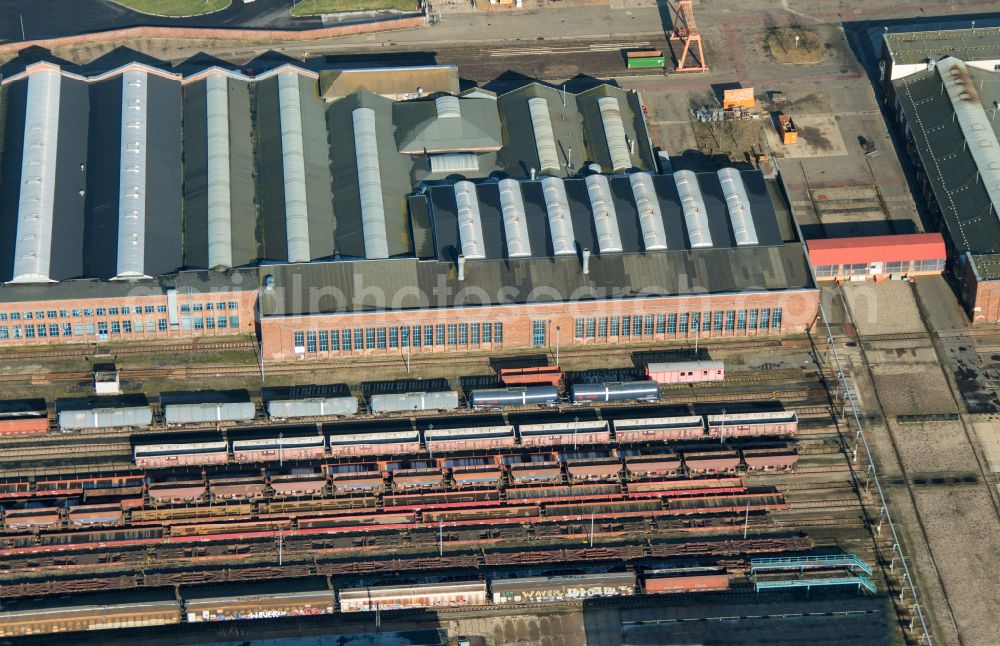 Eberswalde from the bird's eye view: Railway depot and repair shop for maintenance and repair of trains of passenger transport Schienenfahrzeugwerk Eberswalde GmbH on street Eisenbahnstrasse in Eberswalde in the state Brandenburg, Germany