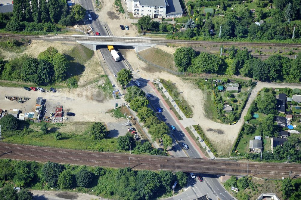 Berlin from the bird's eye view: Blick auf die neu errichtete Bahnbrücke am Glienicker Weg / Glienicker Straße in Berlin - Adlershof. Ausführende Baufirma ist die EUROVIA Beton Gruppe. View of the newly built bridge at Glienicker Weg / Glienicker Strasse in Berlin - Adlershof. Construction company is the EUROVIA group.