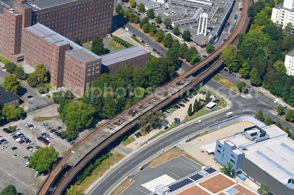 Berlin from above - Station building and track systems of the S-Bahn station Siemensstadt on street Wohlrabedamm in the district Siemensstadt in Berlin, Germany