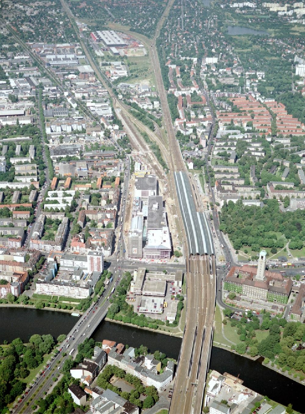 Berlin from the bird's eye view: Station building and track systems of the S-Bahn station to the shopping center Spandau Arcaden and the rail profile over the Havel Bridge in Berlin in Germany