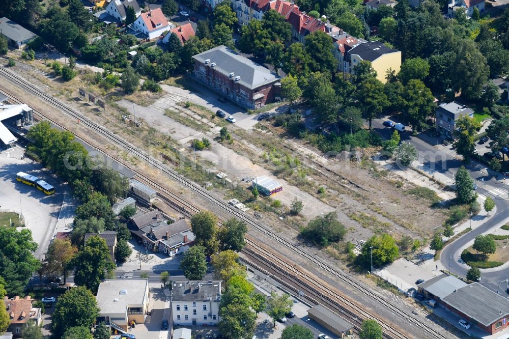 Berlin from the bird's eye view: Station building and track systems of the S-Bahn station on Heinrich-Grueber-Platz in the district Kaulsdorf in Berlin, Germany