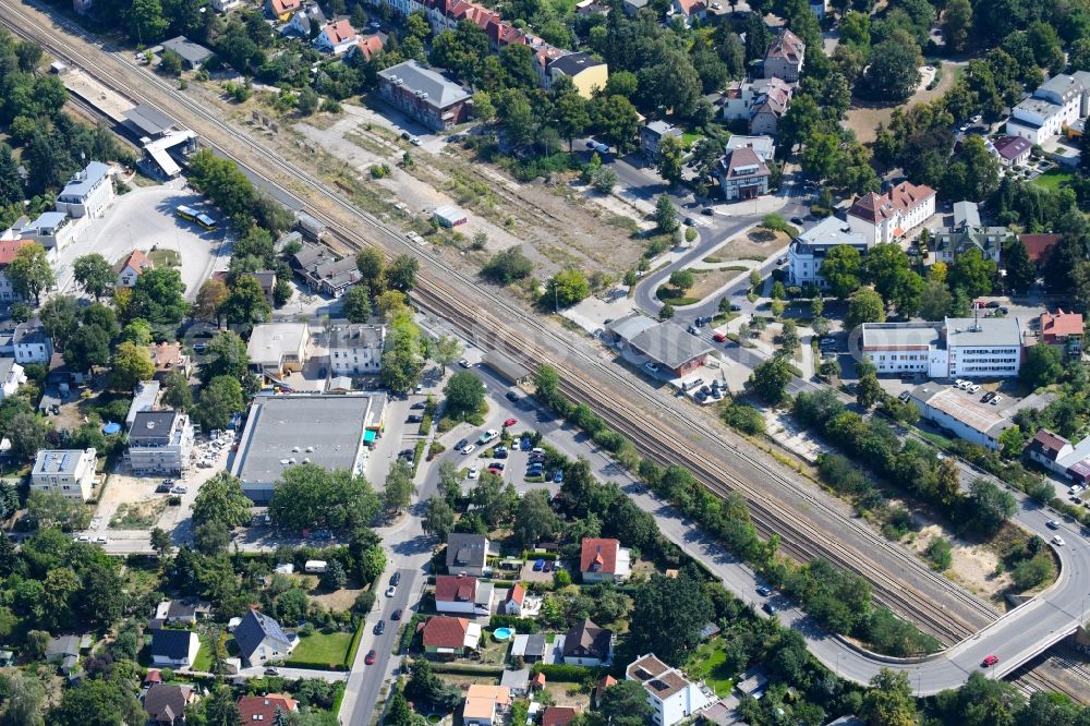 Aerial image Berlin - Station building and track systems of the S-Bahn station on Heinrich-Grueber-Platz in the district Kaulsdorf in Berlin, Germany