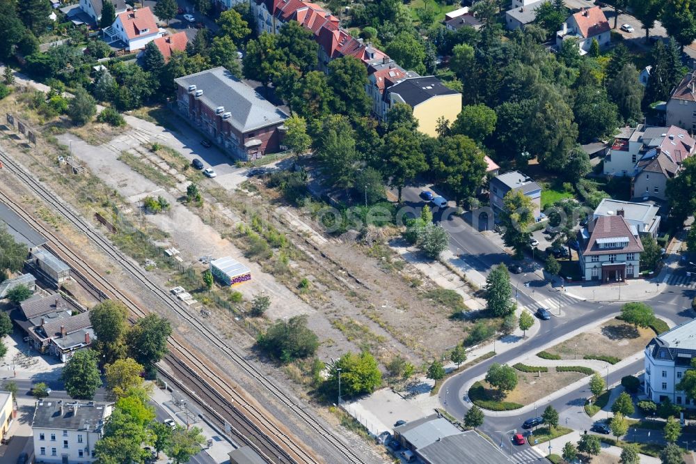 Aerial photograph Berlin - Station building and track systems of the S-Bahn station on Heinrich-Grueber-Platz in the district Kaulsdorf in Berlin, Germany