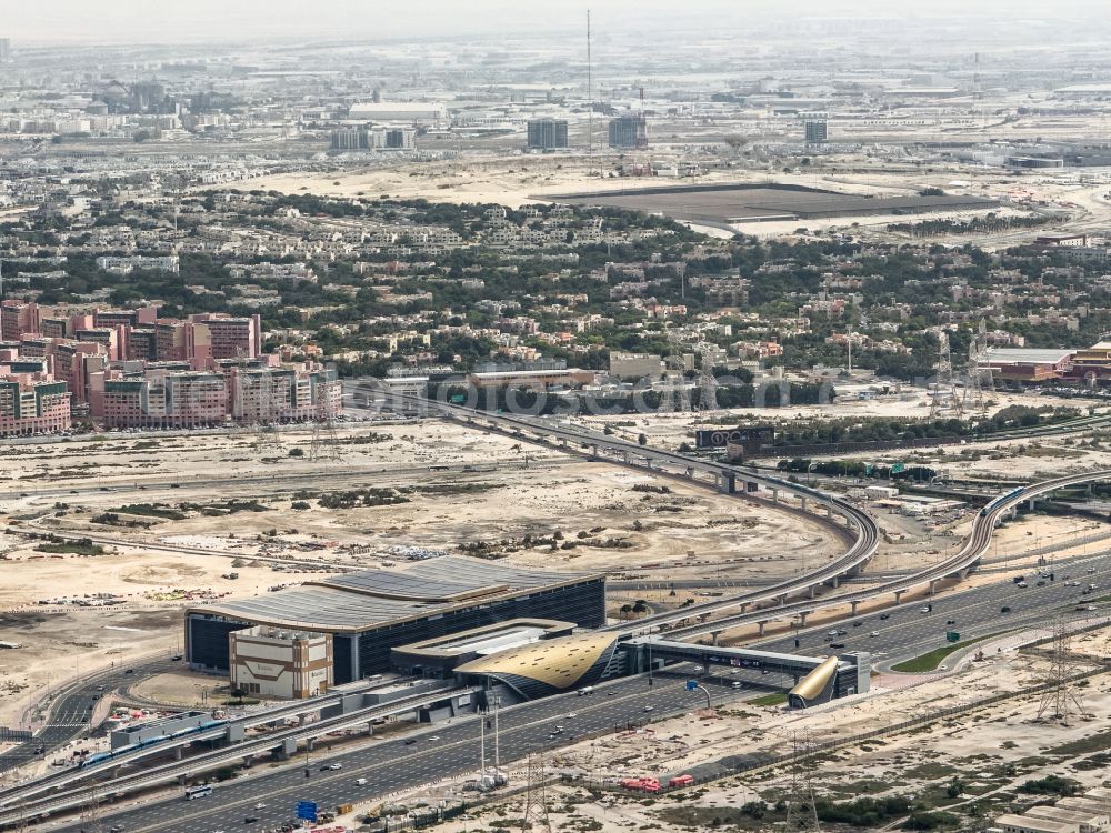 Dubai from above - Station building and track systems of Metro subway station Jabal Ali Metro Station on street Sheikh Zayed Road in Dubai in United Arab Emirates