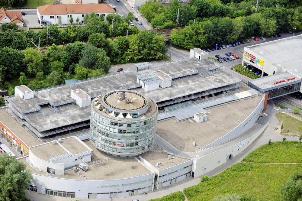 Bernau from the bird's eye view: Blick auf die Bahnhofspassagen in der Börnicker Chaussee in Bernau. Das Einkaufszentrum wurde 1996 eröffnet und wird von der Peter Fritz Immobilien GbR mbH verwaltet. View to the railway station passages in the Börnicker Chaussee in Bernau.The center was opened in 1996 and is managed from the Peter Fritz Immobilien GbR mbH.