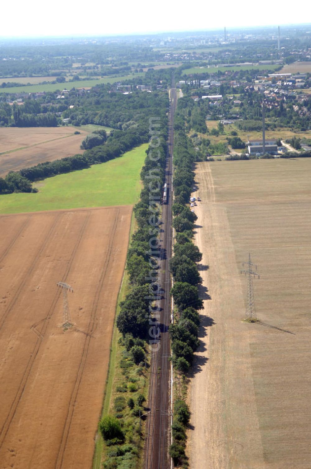 Dessau-Roßlau from the bird's eye view: Blick auf die Bahnstrecke von Dessau-Roßlau nach Bitterfeld-Wolfen. Bis zum 30. Juni 2007 war Wolfen eine eigenständige Stadt. Dessau-Roßlau und Wolfen sind ca. 25 km voneinan der entfernt.