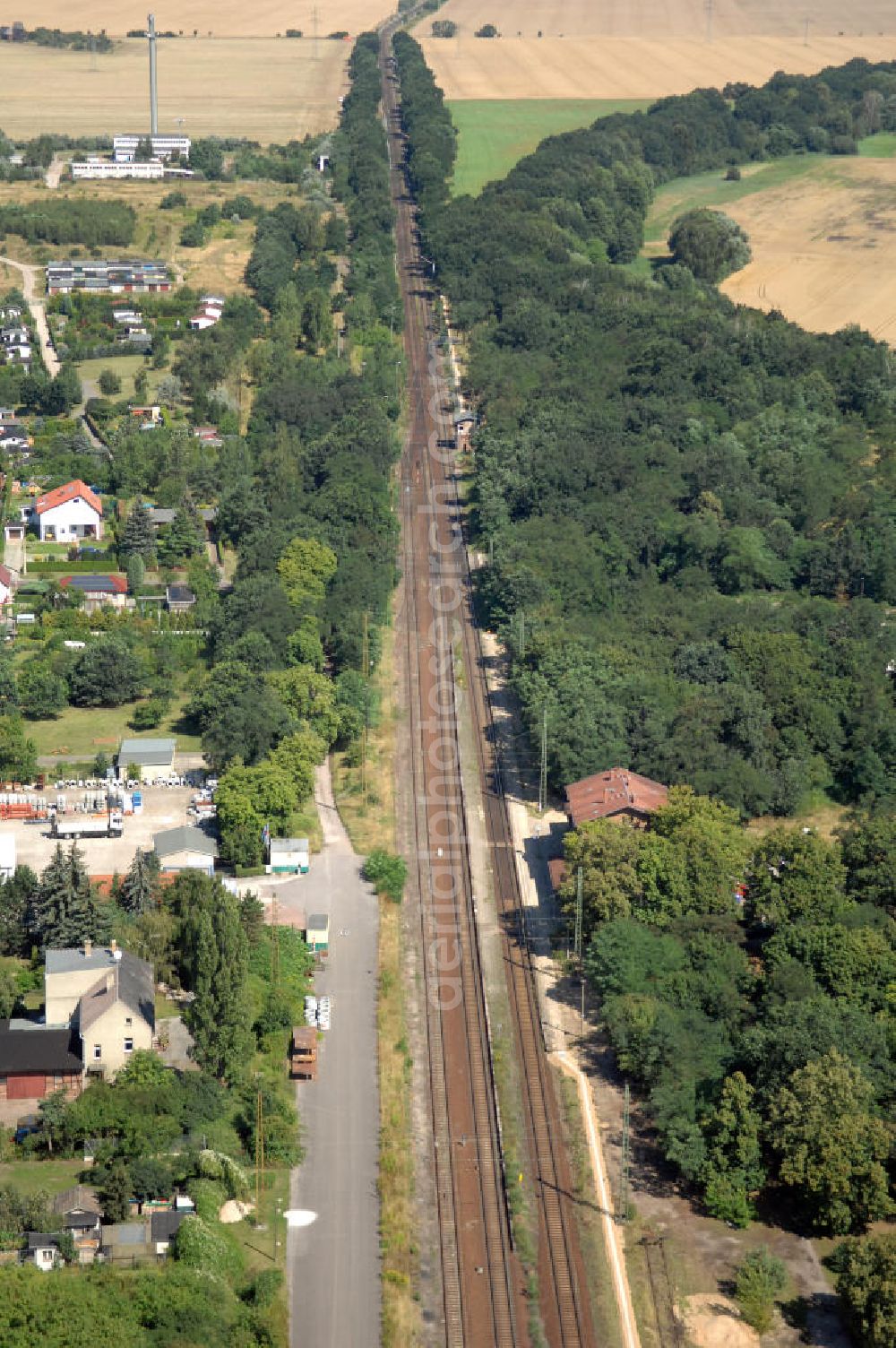 Aerial photograph Dessau-Roßlau - Blick auf die Bahnstrecke von Dessau-Roßlau nach Bitterfeld-Wolfen. Bis zum 30. Juni 2007 war Wolfen eine eigenständige Stadt. Dessau-Roßlau und Wolfen sind ca. 25 km voneinan der entfernt.