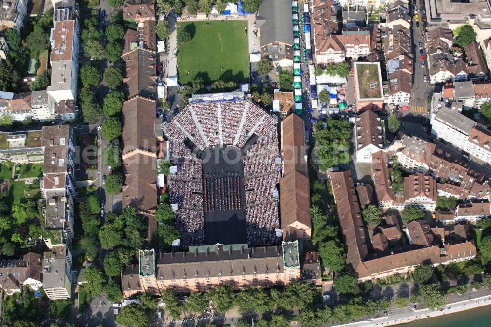 Basel from the bird's eye view: Spectacular open-air event is the military music festival, the tattoo in the barracks courtyard in Basel, Switzerland. Every year, the music show is held close to the river Rhine