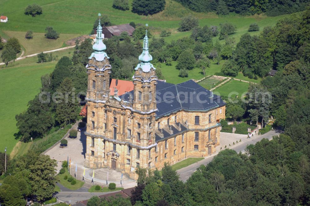 Aerial image Bad Staffelstein - Die Basilika Vierzehnheiligen bei Bad Staffelstein ist eine der bekanntesten Wallfahrtskirchen in Oberfranken. Das nach Plänen von Balthasar Neumann gebaute Gotteshaus ist den heiligen Vierzehn Nothelfern geweiht. Ihre Erbauung war 1743–1772. Adresse: Franziskanerkloster, Vierzehnheiligen 2, 96231 Bad Staffelstein Tel.: 09571/95080