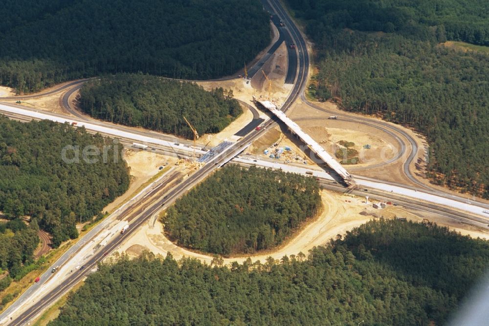 Potsdam from the bird's eye view: Construction site to the motorway exit Potsdam-Babelsberg in the state of Brandenburg. The transport cross connects the motorway A115 and the four-lane expressway Nuthe