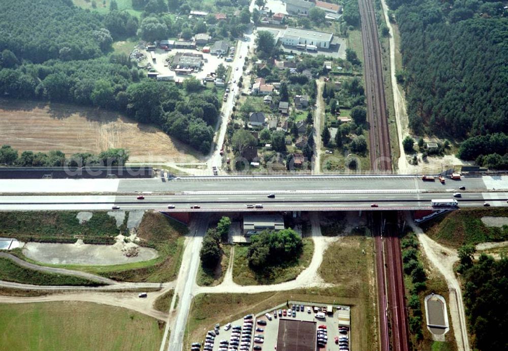 Aerial photograph Königs Wusterhausen - Bau der Autobahnbrücke (A10) über die Straße zwischen Königs Wusterhausen und Niederlehme - ein Projekt der SCHÄLERBAU BERLIN GmbH.