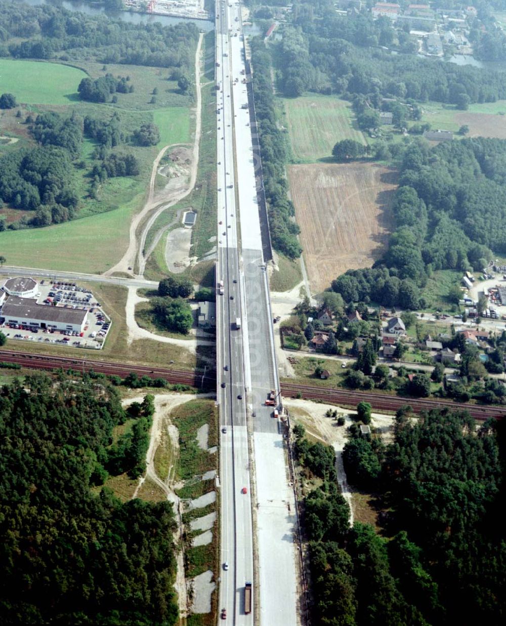 Königs Wusterhausen from the bird's eye view: Bau der Autobahnbrücke (A10) über die Straße zwischen Königs Wusterhausen und Niederlehme - ein Projekt der SCHÄLERBAU BERLIN GmbH.