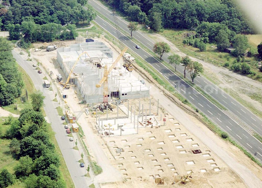 Wustermark - Brandenburg from the bird's eye view: Bau des Factory-Outlet-Centers an der B5 bei Wustermark / Brandenburg.