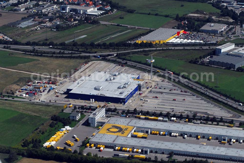 Augsburg from above - Bau des IKEA Einrichtungshauses Augsburg.Gebaut wird die IKEA Filiale in Augsburg auf einer Grundstücksfläche von 80.000 Quadratmetern mit einer Bruttogeschossfläche von 29.000 Quadratmetern. Für die Kunden werden auf dem Gelände 1.440 Parkplätze zur Verfügung stehen. Die Investitionskosten in das neue IKEA Haus betragen ca. 46 Mio. Euro. Begonnen wurde mit den Bauarbeiten im April 2006, und sie verlaufen planmäßig. Am Schnittpunkt der Autobahn A8 München-Stuttgart