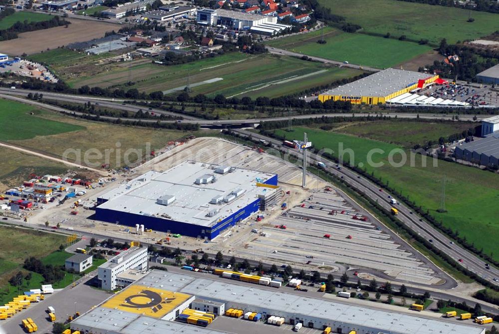 Augsburg from the bird's eye view: Bau des IKEA Einrichtungshauses Augsburg.Gebaut wird die IKEA Filiale in Augsburg auf einer Grundstücksfläche von 80.000 Quadratmetern mit einer Bruttogeschossfläche von 29.000 Quadratmetern. Für die Kunden werden auf dem Gelände 1.440 Parkplätze zur Verfügung stehen. Die Investitionskosten in das neue IKEA Haus betragen ca. 46 Mio. Euro. Begonnen wurde mit den Bauarbeiten im April 2006, und sie verlaufen planmäßig. Am Schnittpunkt der Autobahn A8 München-Stuttgart