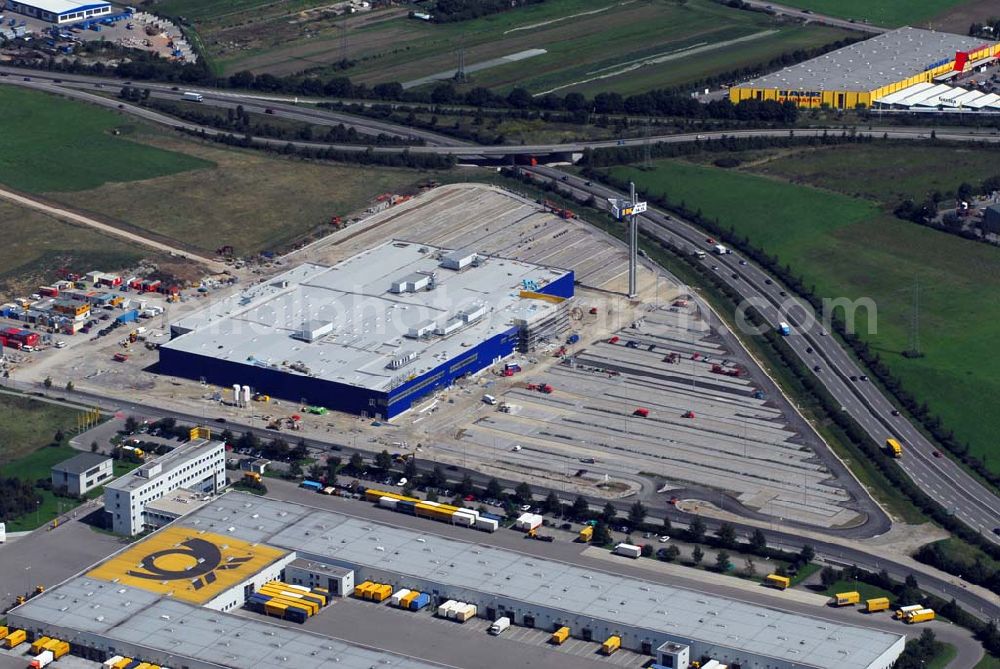 Aerial image Augsburg - Bau des IKEA Einrichtungshauses Augsburg.Gebaut wird die IKEA Filiale in Augsburg auf einer Grundstücksfläche von 80.000 Quadratmetern mit einer Bruttogeschossfläche von 29.000 Quadratmetern. Für die Kunden werden auf dem Gelände 1.440 Parkplätze zur Verfügung stehen. Die Investitionskosten in das neue IKEA Haus betragen ca. 46 Mio. Euro. Begonnen wurde mit den Bauarbeiten im April 2006, und sie verlaufen planmäßig. Am Schnittpunkt der Autobahn A8 München-Stuttgart