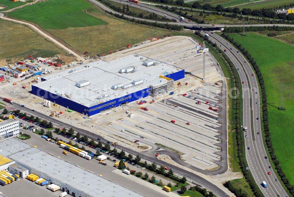 Augsburg from the bird's eye view: Bau des IKEA Einrichtungshauses Augsburg.Gebaut wird die IKEA Filiale in Augsburg auf einer Grundstücksfläche von 80.000 Quadratmetern mit einer Bruttogeschossfläche von 29.000 Quadratmetern. Für die Kunden werden auf dem Gelände 1.440 Parkplätze zur Verfügung stehen. Die Investitionskosten in das neue IKEA Haus betragen ca. 46 Mio. Euro. Begonnen wurde mit den Bauarbeiten im April 2006, und sie verlaufen planmäßig. Am Schnittpunkt der Autobahn A8 München-Stuttgart