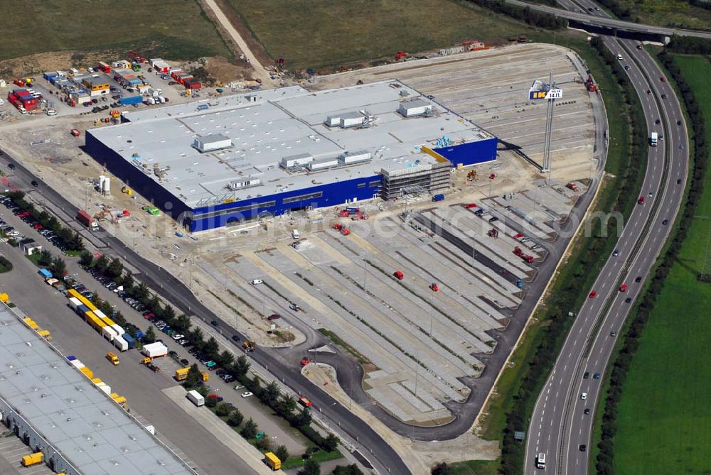 Aerial image Augsburg - Bau des IKEA Einrichtungshauses Augsburg.Gebaut wird die IKEA Filiale in Augsburg auf einer Grundstücksfläche von 80.000 Quadratmetern mit einer Bruttogeschossfläche von 29.000 Quadratmetern. Für die Kunden werden auf dem Gelände 1.440 Parkplätze zur Verfügung stehen. Die Investitionskosten in das neue IKEA Haus betragen ca. 46 Mio. Euro. Begonnen wurde mit den Bauarbeiten im April 2006, und sie verlaufen planmäßig. Am Schnittpunkt der Autobahn A8 München-Stuttgart