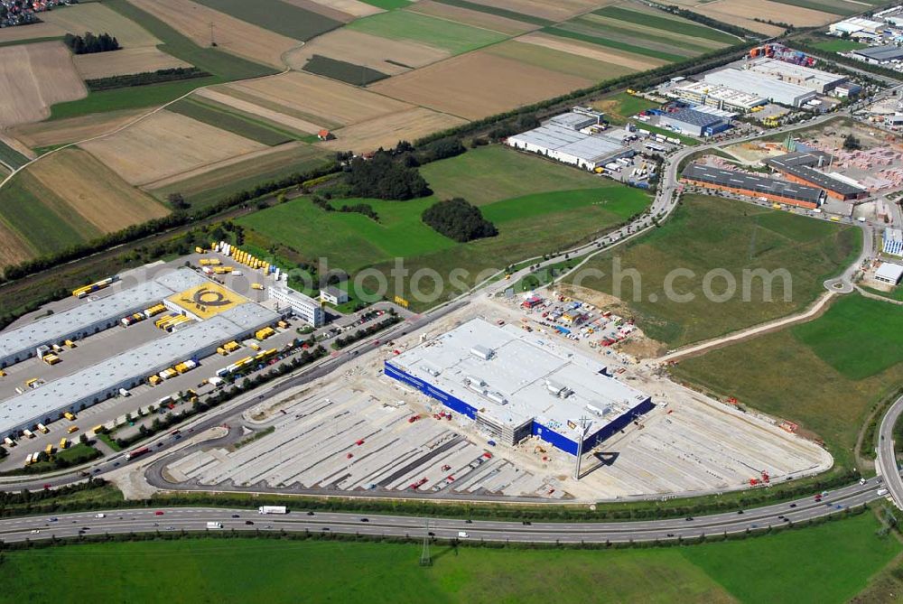 Aerial photograph Augsburg - Bau des IKEA Einrichtungshauses Augsburg.Gebaut wird die IKEA Filiale in Augsburg auf einer Grundstücksfläche von 80.000 Quadratmetern mit einer Bruttogeschossfläche von 29.000 Quadratmetern. Für die Kunden werden auf dem Gelände 1.440 Parkplätze zur Verfügung stehen. Die Investitionskosten in das neue IKEA Haus betragen ca. 46 Mio. Euro. Begonnen wurde mit den Bauarbeiten im April 2006, und sie verlaufen planmäßig. Am Schnittpunkt der Autobahn A8 München-Stuttgart