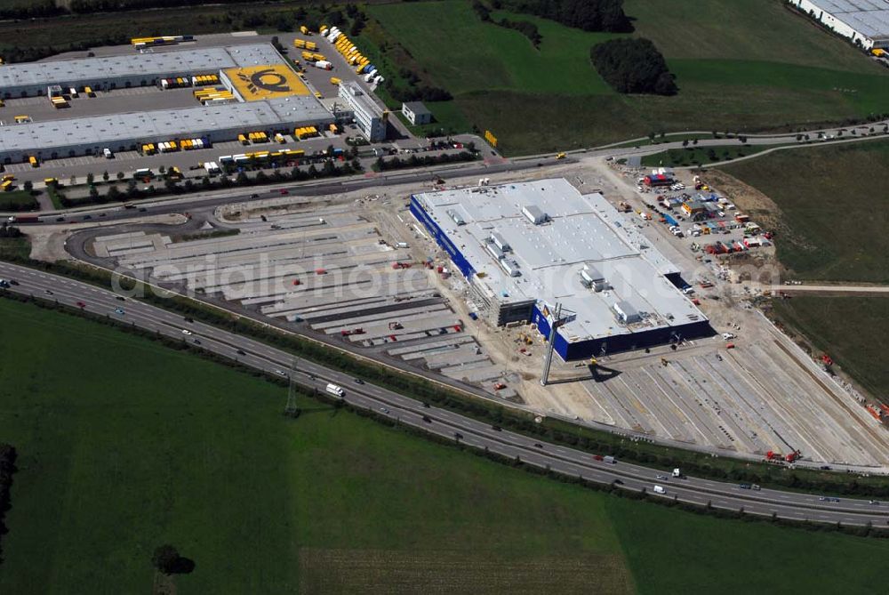 Augsburg from above - Bau des IKEA Einrichtungshauses Augsburg.Gebaut wird die IKEA Filiale in Augsburg auf einer Grundstücksfläche von 80.000 Quadratmetern mit einer Bruttogeschossfläche von 29.000 Quadratmetern. Für die Kunden werden auf dem Gelände 1.440 Parkplätze zur Verfügung stehen. Die Investitionskosten in das neue IKEA Haus betragen ca. 46 Mio. Euro. Begonnen wurde mit den Bauarbeiten im April 2006, und sie verlaufen planmäßig. Am Schnittpunkt der Autobahn A8 München-Stuttgart