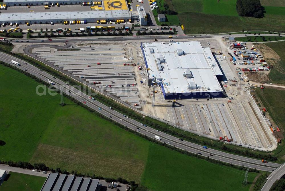 Augsburg from the bird's eye view: Bau des IKEA Einrichtungshauses Augsburg.Gebaut wird die IKEA Filiale in Augsburg auf einer Grundstücksfläche von 80.000 Quadratmetern mit einer Bruttogeschossfläche von 29.000 Quadratmetern. Für die Kunden werden auf dem Gelände 1.440 Parkplätze zur Verfügung stehen. Die Investitionskosten in das neue IKEA Haus betragen ca. 46 Mio. Euro. Begonnen wurde mit den Bauarbeiten im April 2006, und sie verlaufen planmäßig. Am Schnittpunkt der Autobahn A8 München-Stuttgart