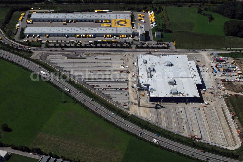 Aerial image Augsburg - Bau des IKEA Einrichtungshauses Augsburg.Gebaut wird die IKEA Filiale in Augsburg auf einer Grundstücksfläche von 80.000 Quadratmetern mit einer Bruttogeschossfläche von 29.000 Quadratmetern. Für die Kunden werden auf dem Gelände 1.440 Parkplätze zur Verfügung stehen. Die Investitionskosten in das neue IKEA Haus betragen ca. 46 Mio. Euro. Begonnen wurde mit den Bauarbeiten im April 2006, und sie verlaufen planmäßig. Am Schnittpunkt der Autobahn A8 München-Stuttgart