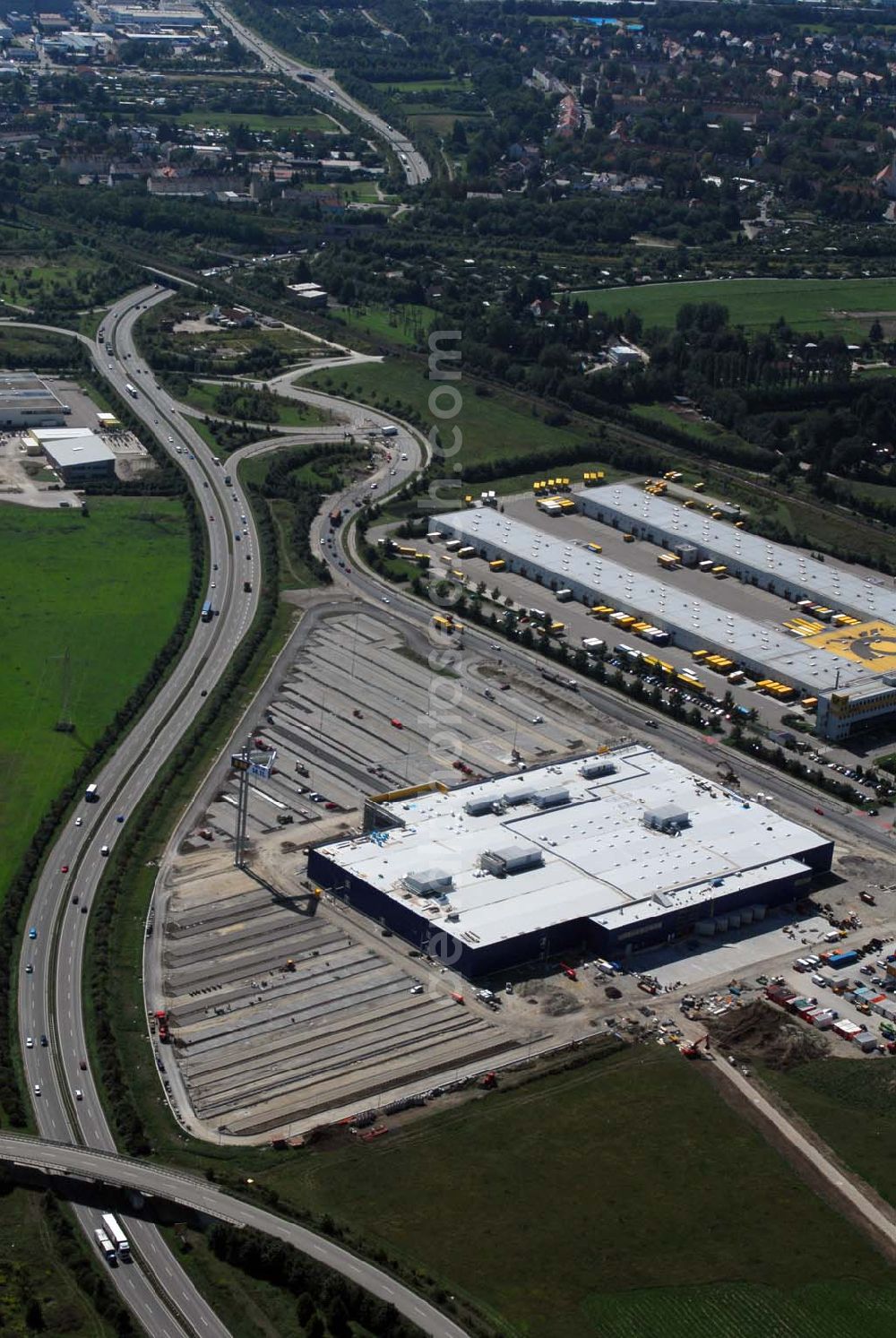 Aerial image Augsburg - Bau des IKEA Einrichtungshauses Augsburg.Gebaut wird die IKEA Filiale in Augsburg auf einer Grundstücksfläche von 80.000 Quadratmetern mit einer Bruttogeschossfläche von 29.000 Quadratmetern. Für die Kunden werden auf dem Gelände 1.440 Parkplätze zur Verfügung stehen. Die Investitionskosten in das neue IKEA Haus betragen ca. 46 Mio. Euro. Begonnen wurde mit den Bauarbeiten im April 2006, und sie verlaufen planmäßig. Am Schnittpunkt der Autobahn A8 München-Stuttgart