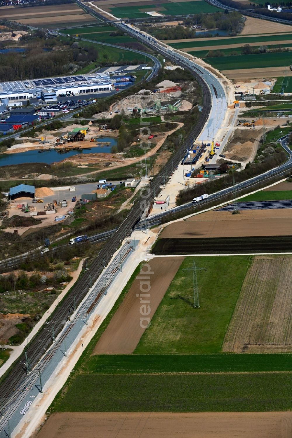 Eggolsheim from the bird's eye view: Construction and maintenance work on the railway track in the German railway with four-track expansion in Eggolsheim in the state Bavaria, Germany