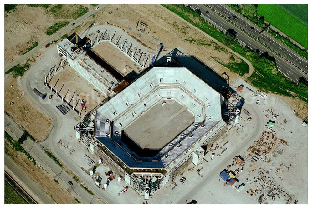 Aerial image Mannheim - 27.05.04 Mannheim, Blick auf die Baustelle der Mannheim Arena am Flughafen Mannheim. MANNHEIM ARENA®,Besitzgesellschaft mbH & Co. KG | Verwaltungsstelle Bergheimerstraße 89/1; 69115 Heidelberg,Tel.: +49 (0) 62 21 - 4 32 06 - 0,Fax: +49 (0) 62 21 - 4 32 06 - 32,E-Mail: info@mannheim-arena.de, Ansprechpartner Matthias Fries, Die neue Mannheimer Arena trägt künftig den Namen „SAP-Arena“. Einen entsprechenden Vertrag mit zehnjähriger Laufzeit unterzeichneten die „Arena Mannheim Besitzgesellschaft mbH“