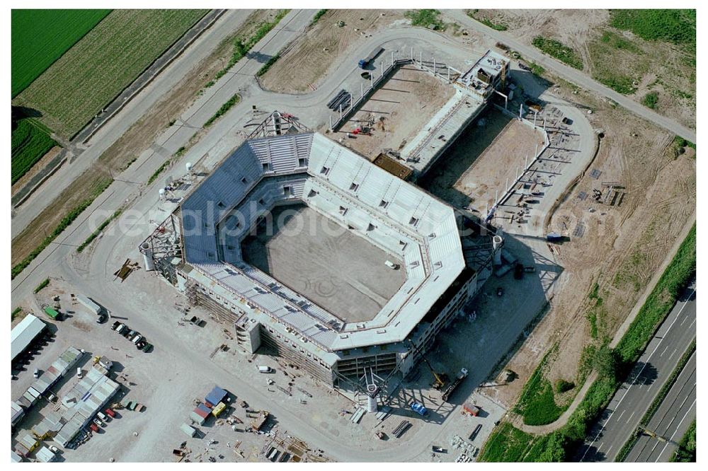 Aerial photograph Mannheim - 27.05.04 Mannheim, Blick auf die Baustelle der Mannheim Arena am Flughafen Mannheim. MANNHEIM ARENA®,Besitzgesellschaft mbH & Co. KG | Verwaltungsstelle Bergheimerstraße 89/1; 69115 Heidelberg,Tel.: +49 (0) 62 21 - 4 32 06 - 0,Fax: +49 (0) 62 21 - 4 32 06 - 32,E-Mail: info@mannheim-arena.de, Ansprechpartner Matthias Fries, Die neue Mannheimer Arena trägt künftig den Namen „SAP-Arena“. Einen entsprechenden Vertrag mit zehnjähriger Laufzeit unterzeichneten die „Arena Mannheim Besitzgesellschaft mbH“