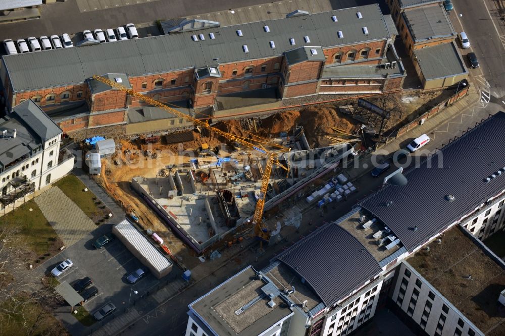 Leipzig from the bird's eye view: Construction site of an apartment building in Goldschmidtstraße Leipzig in Saxony.The rear part of the house redesigned Archive of the University of Leipzig