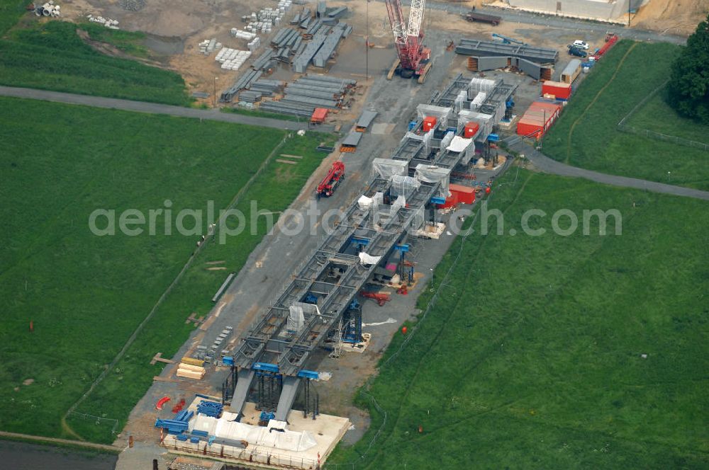 Aerial image Dresden - Blick auf die im Bau befindliche Waldschlösschenbrücke über die Elbe in Dresden mit den Stahlträgern der belgischen Firma Victor Buyck Steel Constructions nach Vorgaben des Büros AWB Architekten Architekturbüro Bauer BDA und Bauleistungen der EUROVIA Beton GmbH. View the construction site of Waldschlösschen bridge over the Elbe in Dresden / Saxony.