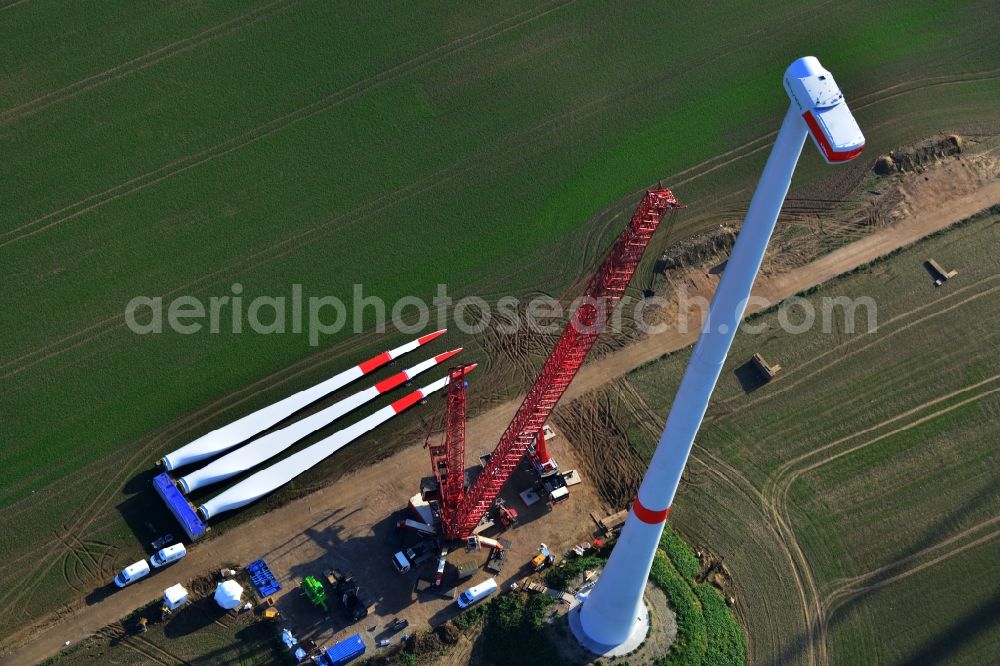 Prenzlau from the bird's eye view: Construction of a wind turbine of company Senvion in Prenzlau in the state of Brandenburg. In the background lying the rotor blades