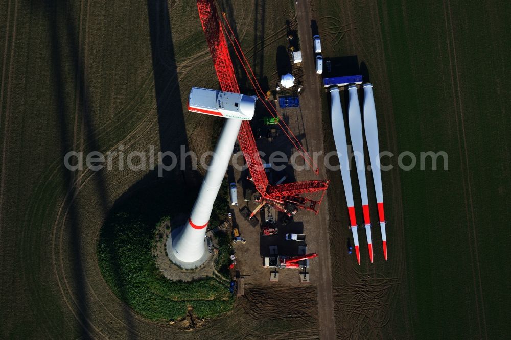 Aerial image Prenzlau - Construction of a wind turbine of company Senvion in Prenzlau in the state of Brandenburg. In the background lying the rotor blades