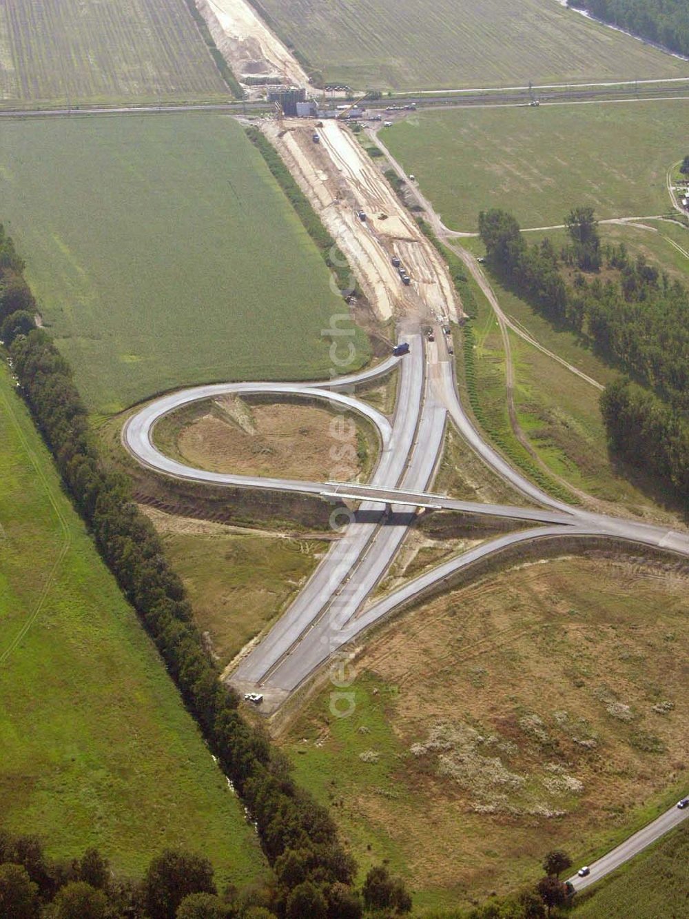 Aerial photograph Trebbin - Mit den Bauarbeiten an der Umfahrung sollte im April 2004 begonnen werden. Der Termin für die Fertigstellung dieses Abschnitts ist auf Mitte 2006 verschoben. Markt 1 - 3, 14959 Trebbin, Telefon: +49 33731 / 8420, Telefax: +49 33731 / 230911, Achim Walder: