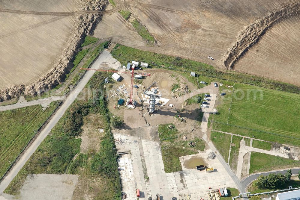 Schönefeld from the bird's eye view: Bauarbeiten am BBI Infotower in Schönefeld. Der ca. 32 m hohe BBI Infotower bietet einen Überblick über die Bauarbeiten am Flughafen Schönefeld. Construction work on BBI Info Tower in Schoenefeld. Bauherr: Flughafen Berlin-Schönefeld GmbH (FBS), Architekten und Generalplaner: Kusus + Kusus Architekten Berlin, Generalunternehmer: PORR Deutschland Gmbh, Zweigniederlassung Berlin. The 32 m high BBI Info Tower offers an overview of the construction work at Schoenefeld Airport. Building owner: Flughafen Berlin-Schönefeld GmbH (FBS), Architect and generalplanner: Kusus + Kusus Architekten Berlin, prime contractor: PORR Deutschland Gmbh, Zweigniederlassung Berlin