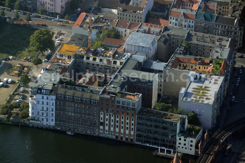 Aerial image Berlin - Construction works on a residential block of historic buildings on Cuvrystrasse in the Wrangelkiez quarter of the Kreuzberg part of Berlin in Germany