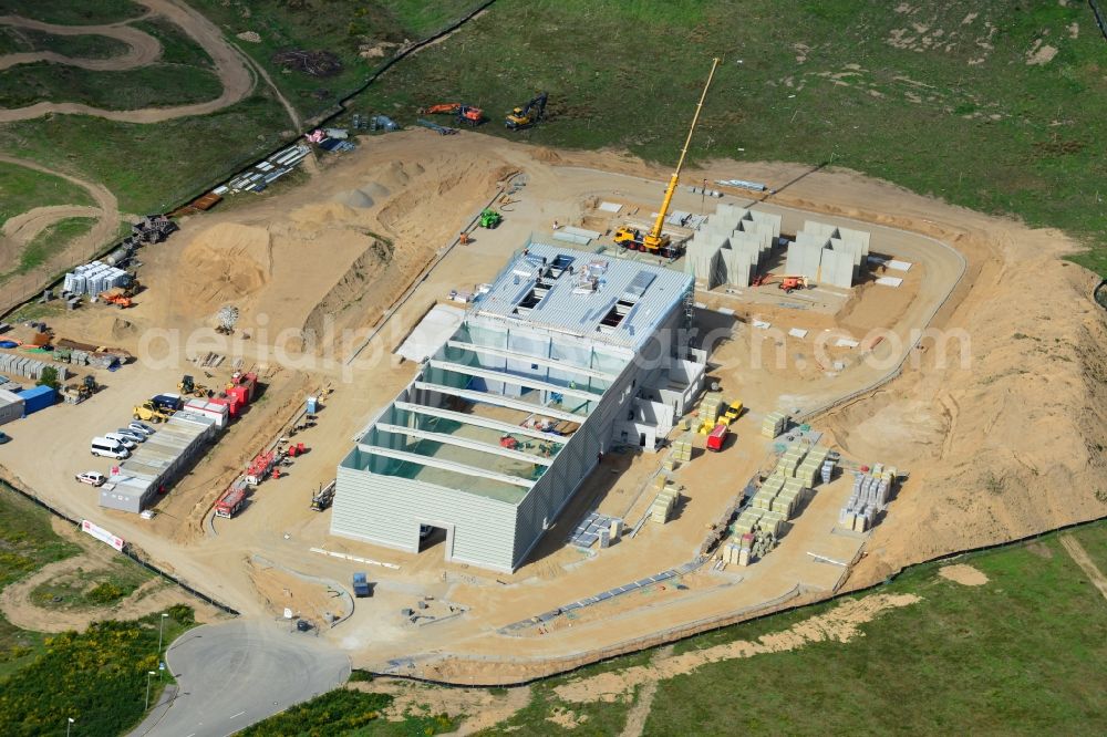 Schwerin from above - Construction works of a building of CVP in the Industrial Park Schwerin in Schwerin in the state of Mecklenburg - Western Pomerania. The newly developed industrial and commercial area is currently under construction in a forest area in the South of Schwerin. A building of CVP Clean Value Plastics is being developed on site