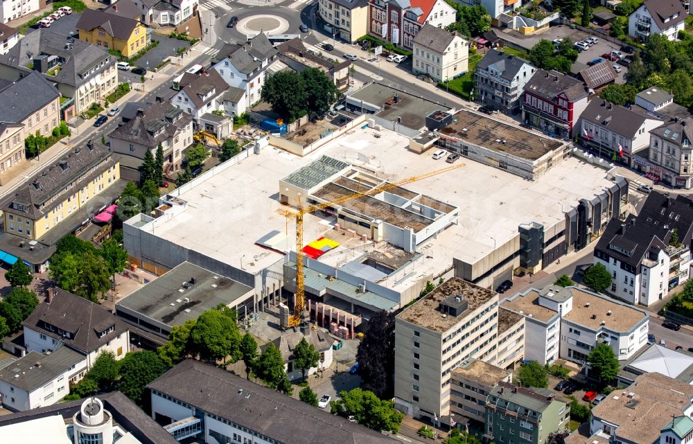 Arnsberg from the bird's eye view: Construction on the building of the shopping center at Europaplatz in Arnsberg in North Rhine-Westphalia