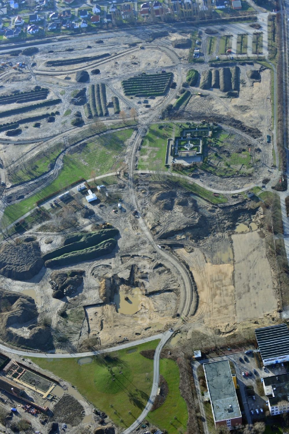 Berlin Marzahn from above - Construction work for the redesign on the area of the recreational park Marzahn because of the IGA 2017. The heart of the International gerden exibition will be the Gaerten der Welt. The Kienberg and parts of Wuhle valley will be included. To be built are hillside terraces and a bridge over the Wuhle and Wuhleteich until the beginning of the exhibition