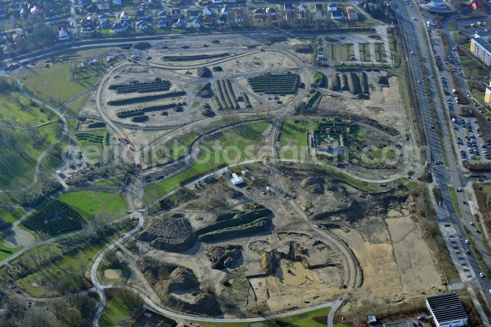 Berlin Marzahn from the bird's eye view: Construction work for the redesign on the area of the recreational park Marzahn because of the IGA 2017. The heart of the International gerden exibition will be the Gaerten der Welt. The Kienberg and parts of Wuhle valley will be included. To be built are hillside terraces and a bridge over the Wuhle and Wuhleteich until the beginning of the exhibition