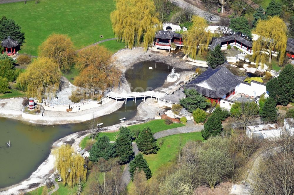 Aerial photograph Berlin - Construction work at Blumberger Damm to the visitor center at the entrance to the IGA 2017 in the Marzahn-Hellersdorf district of Berlin. The heart of the International Garden Exhibition will be the gardens of the world and the area on the Kienberg