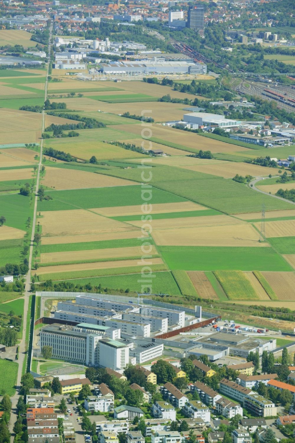 Stuttgart from the bird's eye view: Construction works at the prison grounds and high security fence Prison in the district Stammheim in Stuttgart in the state Baden-Wuerttemberg