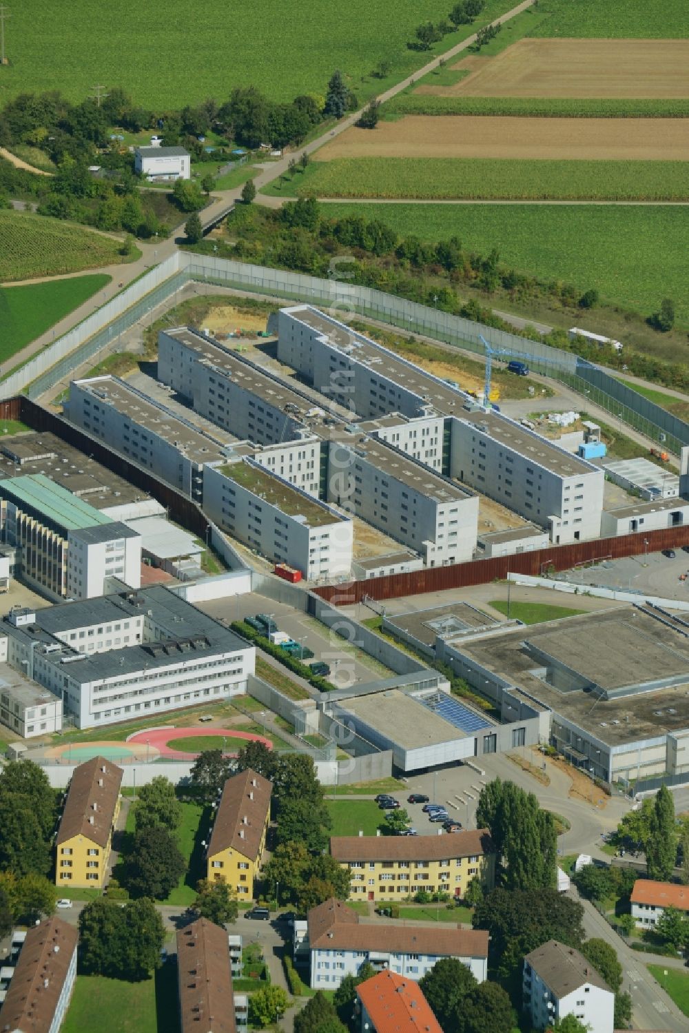 Aerial image Stuttgart - Construction works at the prison grounds and high security fence Prison in the district Stammheim in Stuttgart in the state Baden-Wuerttemberg