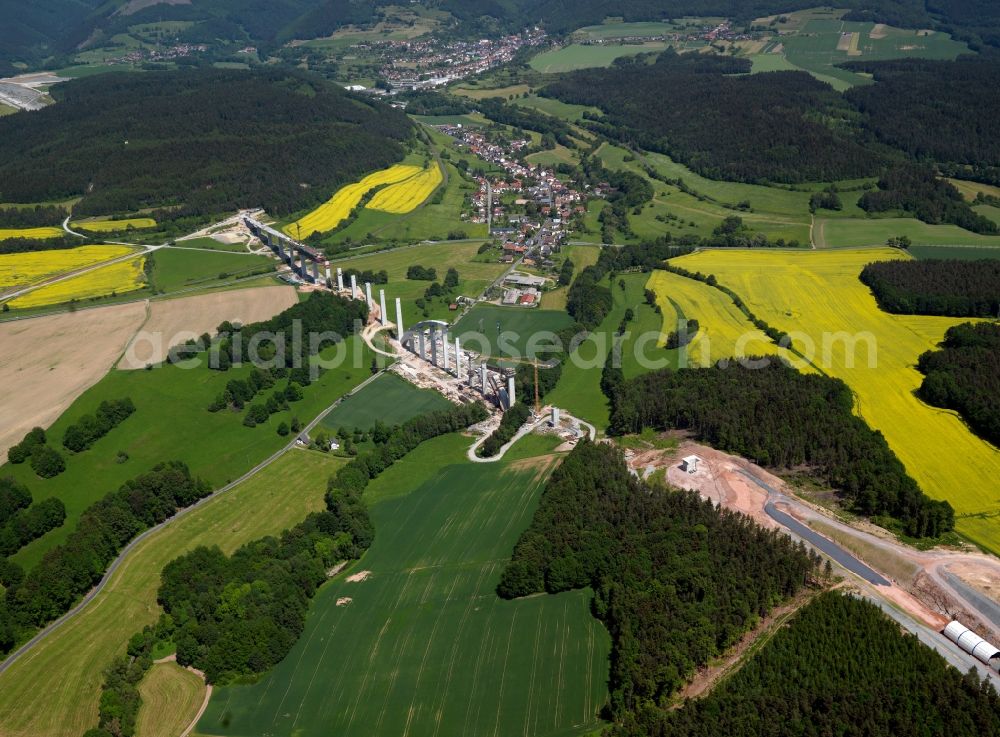 Aerial image Grümpen - Construction site at the Grümpentalbrücke in Southern Thuringia. The traffic and infrastructre project Deutsche Einheit (German Unity) No. 8 includes the construction of a new ICE track between the cities of Nürnberg, Erfurt and Leipzig. Owner is the Deutsche Bahn railway corporation. The bridge is will be the longest arch bridge of its kind in Europe. It is located south of the village of Grümpen. Adjacent construction work is being done for the new railway track