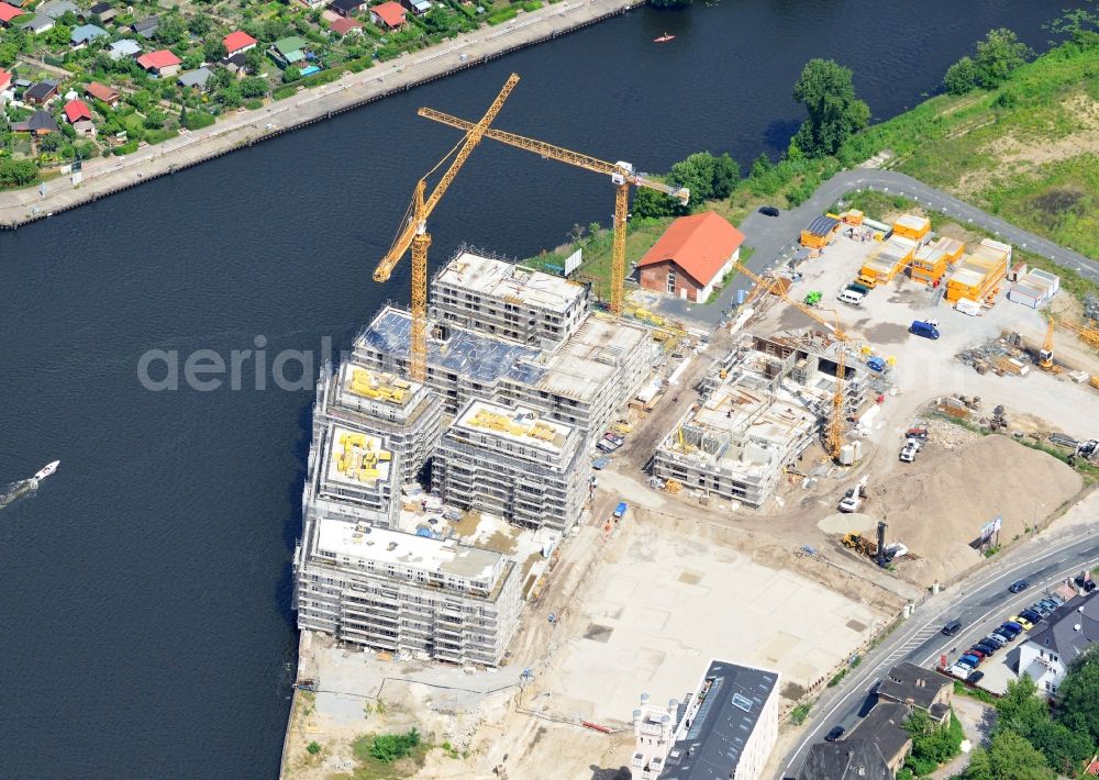 Potsdam from the bird's eye view: View of the construction works in the historic warehouse district in Potsdam. Condominia and tenements are going to develop