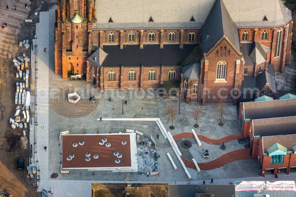 Gelsenkirchen from the bird's eye view: Construction works in front of the church building of the catholic church St.Augustinus in the city center of Gelsenkirchen in the state of North Rhine-Westphalia