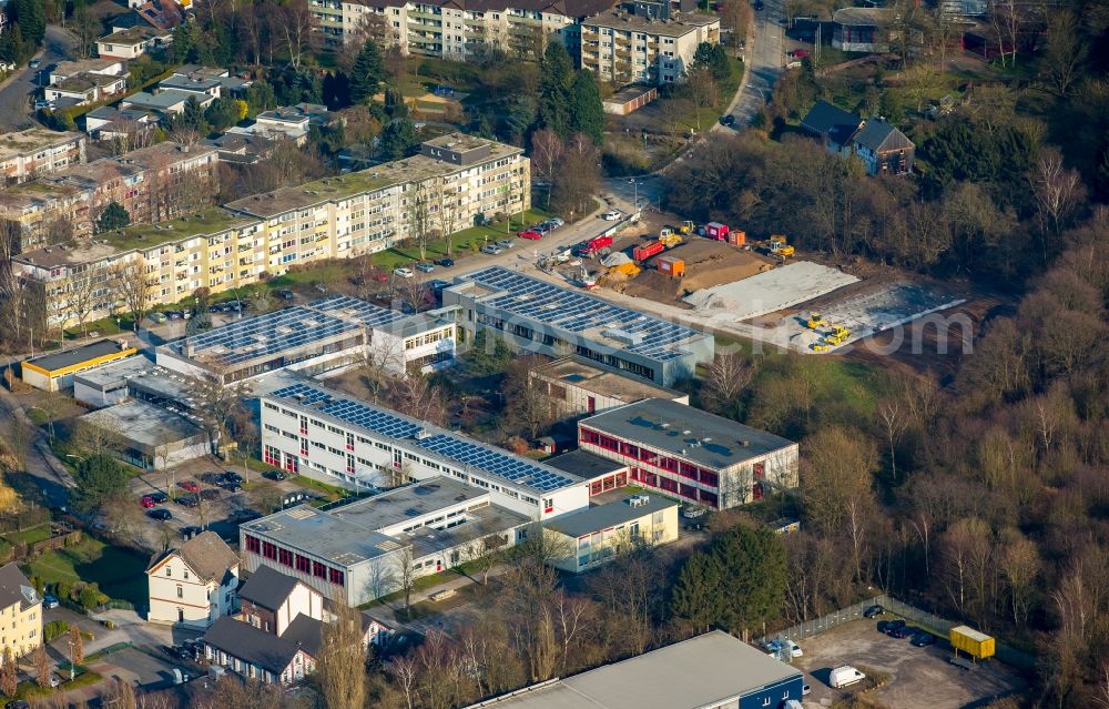 Sprockhövel from the bird's eye view: Construction site adjacent to the school building of the secondary school Gemeinschaftshauptschule on Dresdener Strasse in Sprockhoevel in the state of North Rhine-Westphalia